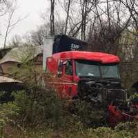 <p>A tractor-trailer driver escaped injury during a rollover crash.</p>