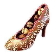 <p>The signature chocolate high heel filled with chocolate truffles from Village Sweets LLC (75 Rt. 15 in Newton)</p>