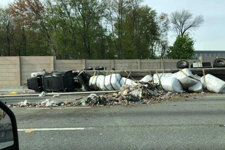 Overturned Tractor Trailer Spills Garbage Across Route 80 Entrance Ramp In Parsippany