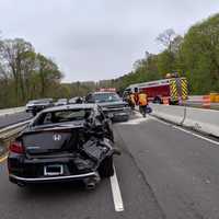 <p>Three people were injured during a crash on the Merritt Parkway.</p>