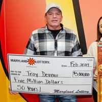 Small Business Owner Not Ready For Retirement After Winning $5M On Maryland Lottery Scratcher