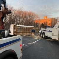 <p>The roll-off truck on its side at the &quot;S&quot; turn at Lemoine and Fletcher avenues.</p>