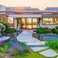 $26M 'Breathtaking' Mass Beachfront Mansion Comes With Waterfall, Sauna, Rooftop Infinity Pool