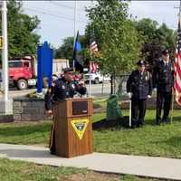 <p>Project coordinator Sgt. Paul Haggerty with LPD Honor Guard.</p>