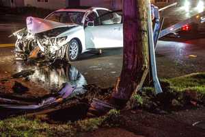 Sedan Slams Into Utility Pole In Fair Lawn