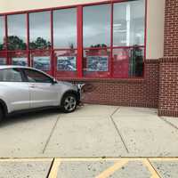 <p>A driver lost control and drove into the side of a Norwalk CVS store.</p>