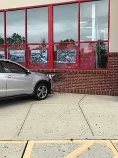 Two Hospitalized After Car Crashes Into CVS In Norwalk