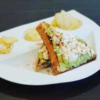 <p>Open-face avocado toast from TimeOut Cafe.</p>