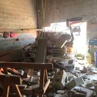 <p>Two employees were injured when a truck slammed into a business.</p>