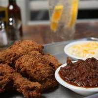 <p>Chicken wings at Judy&#x27;s Bar  &amp; Kitchen in Stamford come charred and crispy.</p>