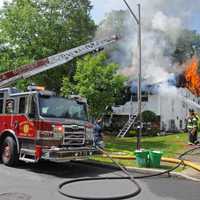 <p>Firefighters battle a large fire at a Monsey home.</p>