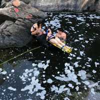 <p>First responders work to save a woman who fell.</p>