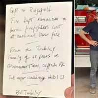 <p>Bill Trabilcy with Ridgefield Deputy Fire Chief David Brierty</p>