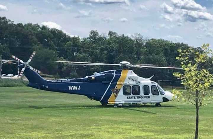 A 78-year-old woman was airlifted with serious injuries after she accidentally ran herself over with her own car in Warren County, state police said.