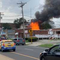 <p>A fire consumed a three-story rooming house in Bridgeport.</p>