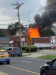 Man Rescued Hanging From Third-Floor Window During Bridgeport Two-Alarm Fire