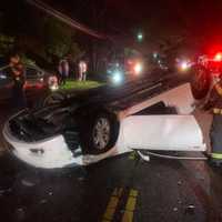 <p>A driver was hospitalized after an overturn crash in Islip on Wednesday night.</p>