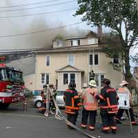 <p>Bridgeport firefighters battle a two-alarm blaze at a rooming house.</p>