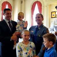 <p>Lieutenant Laura Flynn and her family at the ceremony.</p>