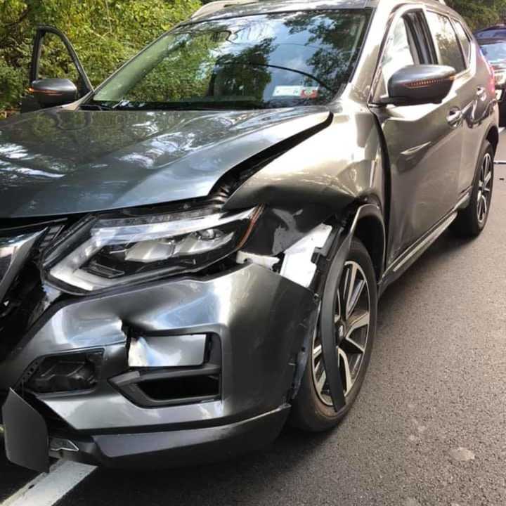 Ramapo Police said a bear darted into the woods after being hit by a vehicle.