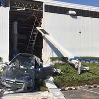 <p>A driver hit the gas instead of the brakes and crashed through a business.</p>