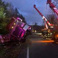 <p>A tractor-trailer carrying eggs ran off the road and overturned.</p>