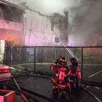 <p>Firefighters were forced to work from outside as flames shot through the Rosa Parks Boulevard home.</p>