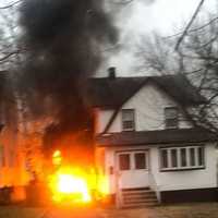 <p>The Tilden Avenue car fire in Teaneck spread to a house. No injuries were reported.</p>