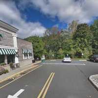 Rockland Couple's SUV Tumbles Into Brook Between Shopping Center, High School In Montvale
