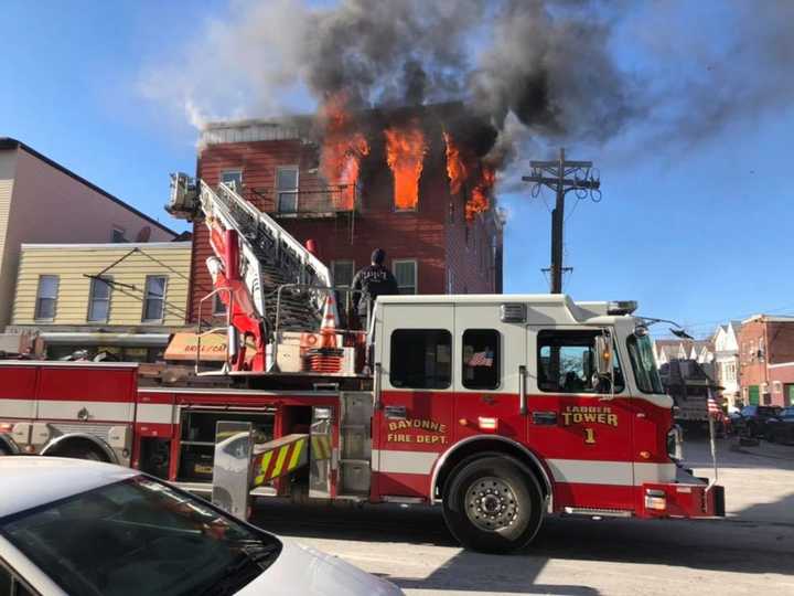 A fire tore through a multifamily home in Bayonne Thursday, leaving nearby 20 people homeless.