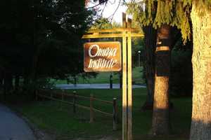 Woman Charged In Cabin Fire At Clinton's Omega Institute 