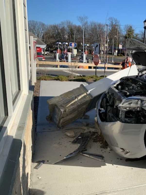 Car Crashes Into Post In Front Of Popular Bagel Shop In Area