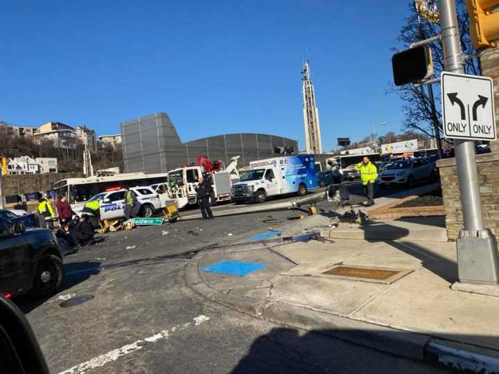 A crash near the Lincoln Tunnel toppled a traffic light Thursday morning.