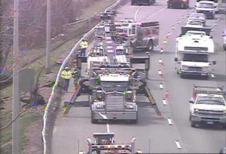 Heavy equipment is at the scene of a tractor-trailer crash on northbound I-95 in Fairfield on Friday.