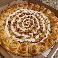 <p>Chicken bacon ranch pizza with garlic knot crust from Pies On Nine in Beachwood</p>