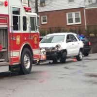 <p>The vehicle had to be towed after crashing into the building on Old Tappan Road.</p>