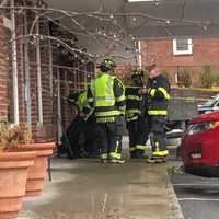 <p>Old Tappan firefighters survey the damage.</p>