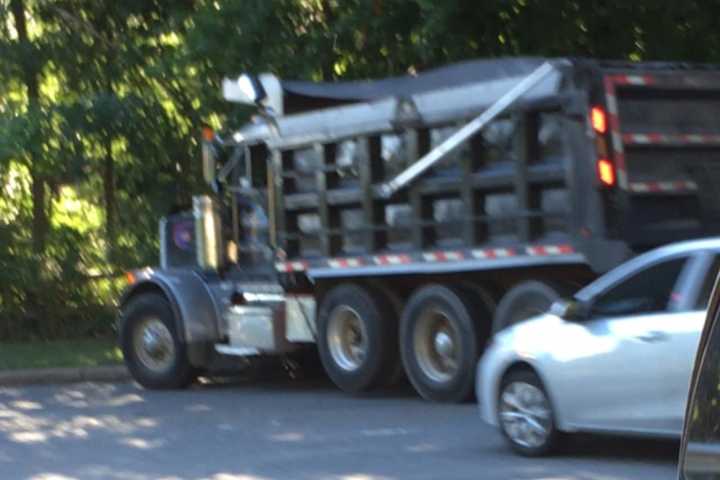 Dump Truck Hits Hawthorne Guardrail