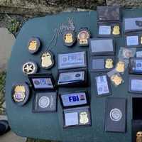 <p>Some of the badges and IDs for the FBI, the DEA, the U.S. Marshals Service and the federal Bureau of Prisons that federal agents said they found at the home of Airmont Deputy Mayor Brian Downey.</p>