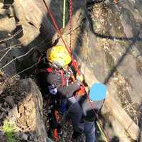 <p>Rappelling down to the water.</p>