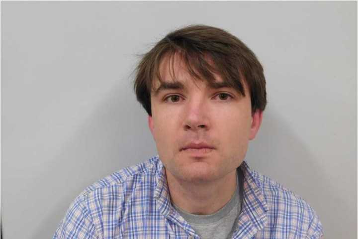 Man Accused Of Fleeing Scene On Foot After Car Crashes Through Fence Into Backyard In Westport