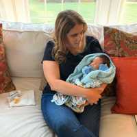 <p>Luciana Machado Lira with the baby.</p>