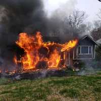 <p>A two-alarm fire at a Sussex County home caused the death of a family dog, officials said.</p>