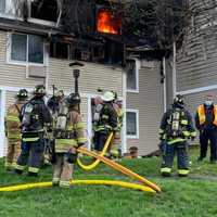 <p>Firefighters battle a blaze that left 12 residents homeless.</p>