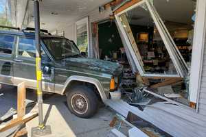 Photos: Jeep Crashes Into Popular Food Store In Area