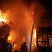 <p>Four buildings were destroyed during a fast-moving three-alarm fire.</p>