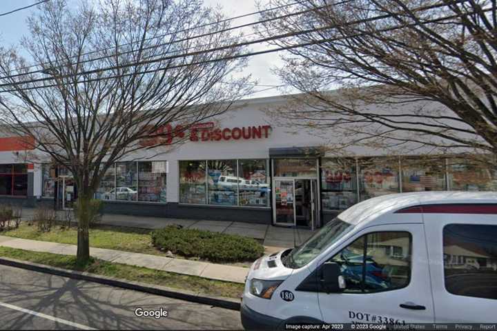 An employee at the Uniondale 99-cent store after authorities allegedly discovered the store was selling hundreds of illegal fireworks.