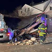 Of All Places: SUV Crash Destroys Auto Repair Shop In Bergenfield