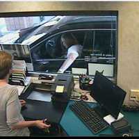 <p>New York State police are asking for help in identifying the woman who tried to cash a stolen check in Mohegan Lake.</p>