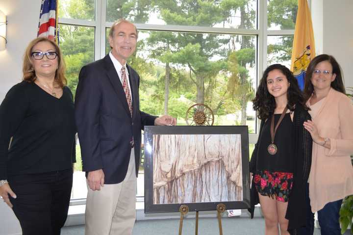 Alexandra Gutierrez was honored by Congressman Scott Garrett for her piece, &quot;Split Vision.&quot;